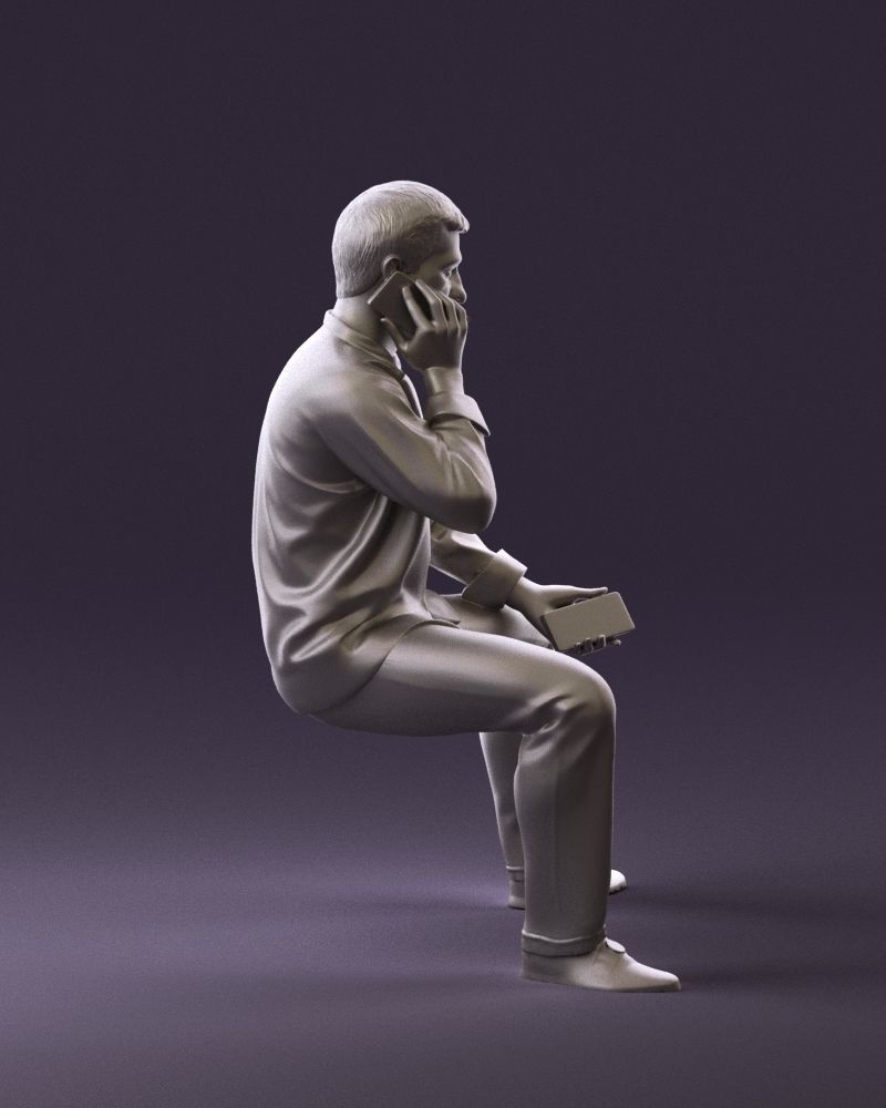 Smart Male Sitting Talking On A Mobile Phone Figure