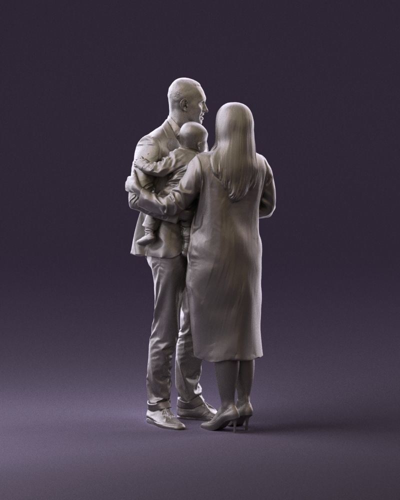 Young Couple Posing With Child Figure