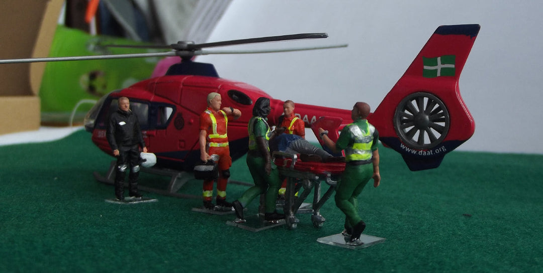 MM999 Ambulance Crew With Patient