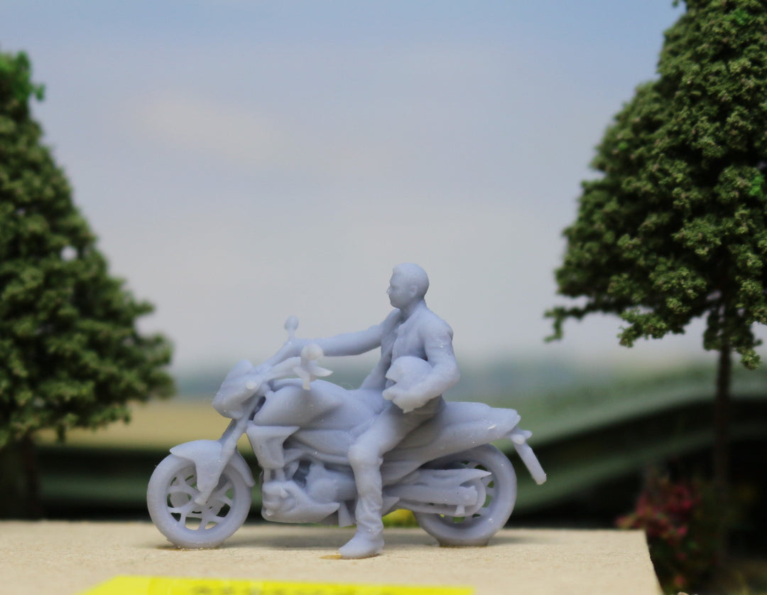 Motorcyclist Sitting On Motorbike Figure