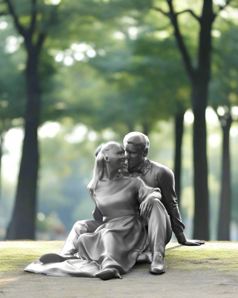 Young Couple Sitting On Ground Figure